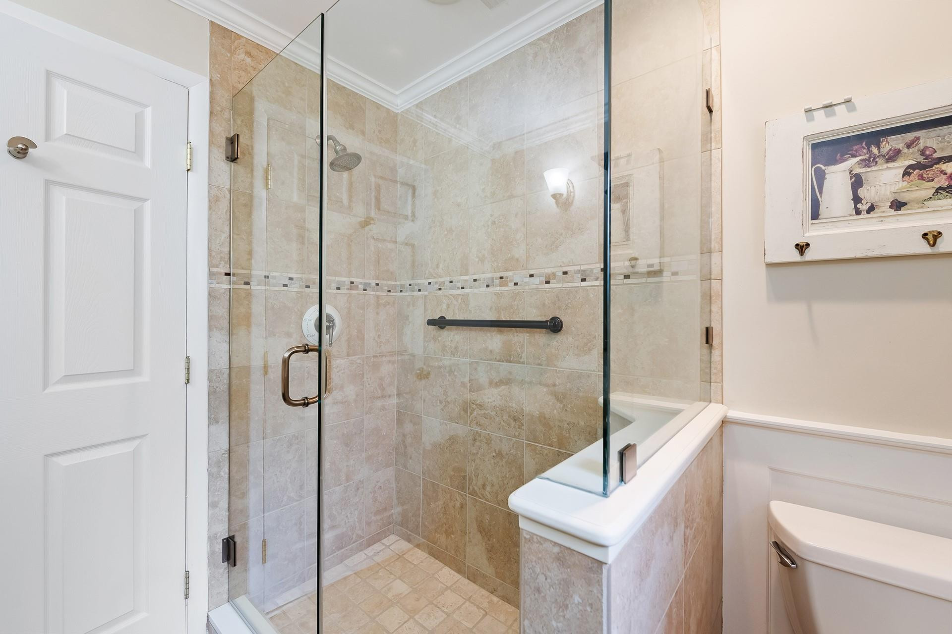10344 Sunset Bend Drive Boca Raton, FL 33428 - Photo 20 of 32 a bathroom with a shower and a toilet