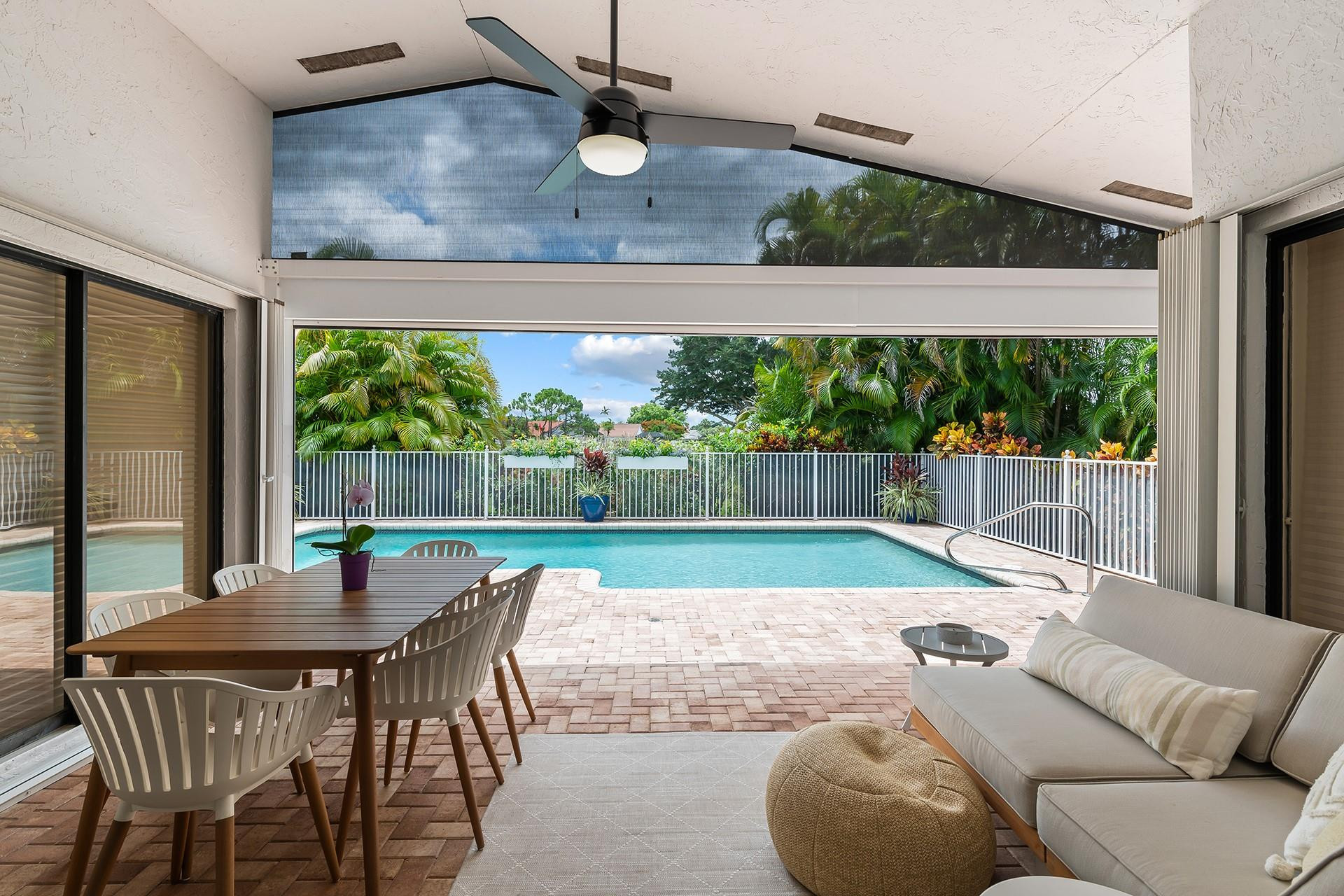 10344 Sunset Bend Drive Boca Raton, FL 33428 - Photo 21 of 32 a outdoor dining space with furniture and outdoor view