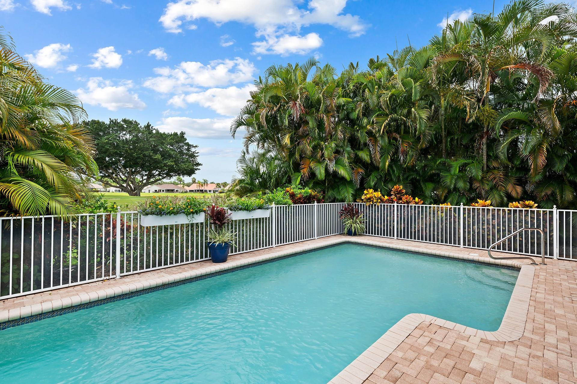 10344 Sunset Bend Drive Boca Raton, FL 33428 - Photo 23 of 32 a view of a deck with a yard