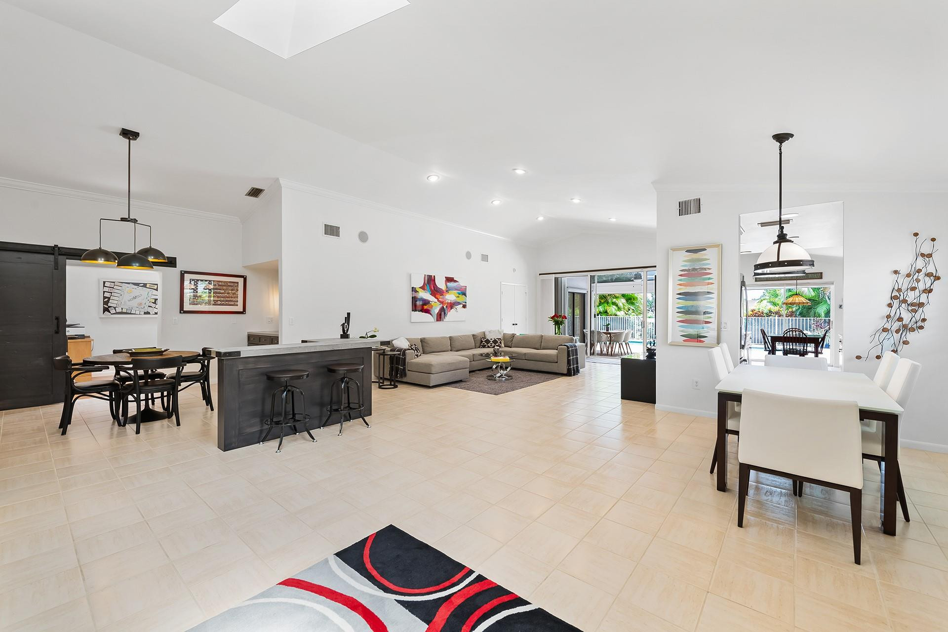 10344 Sunset Bend Drive Boca Raton, FL 33428 - Photo 7 of 32 a living room with furniture and a flat screen tv