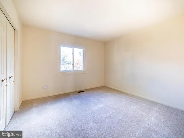 a view of a room with wooden walls