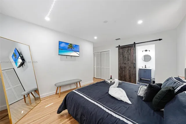 a bedroom with furniture and a bed