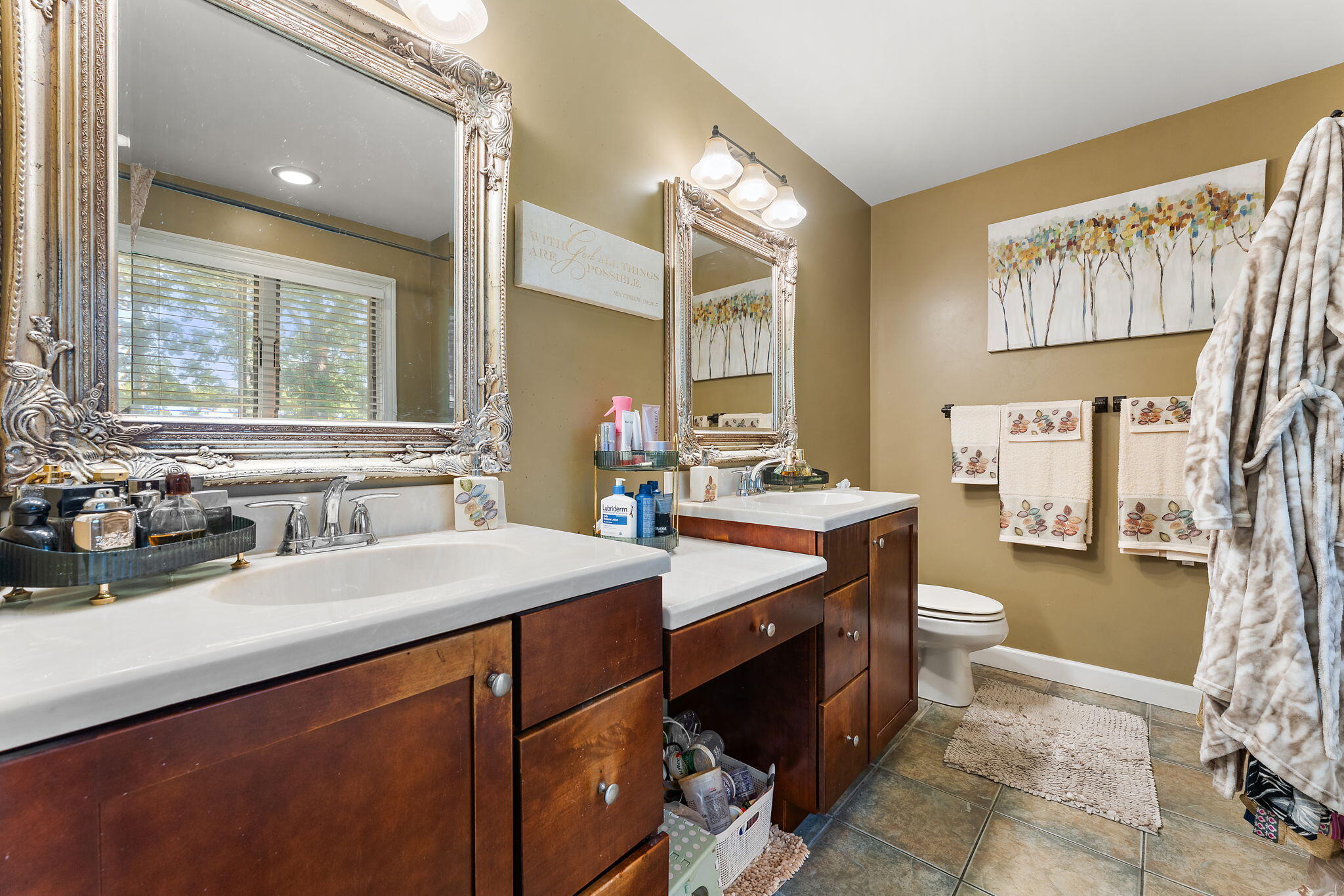 5371 72nd Avenue Schererville, IN 46375 - Photo 16 of 28 a spacious bathroom with a sink double vanity and a mirror
