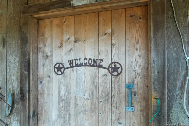 a view of a outdoor space with patio furniture and a fire pit