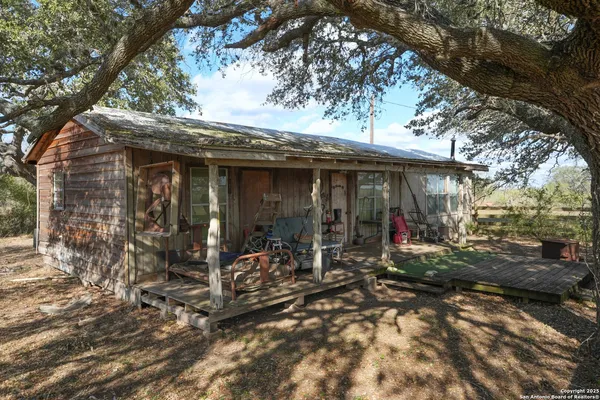 a view of a studio with wooden floor