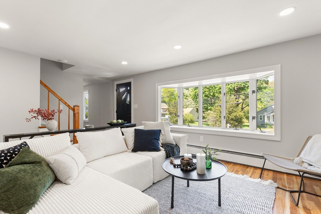 1049 Pleasant Street Canton, MA 02021 - Photo 3 of 16 a living room with furniture and a large window