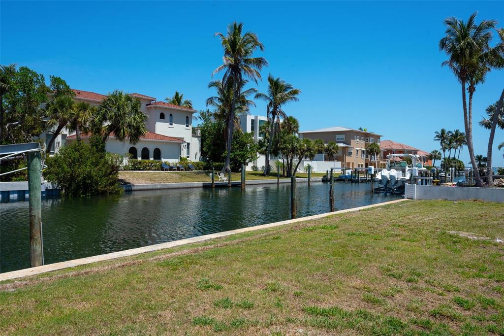 581 Rountree Drive Longboat Key, FL 34228 - Photo 11 of 50 a view of a lake with houses