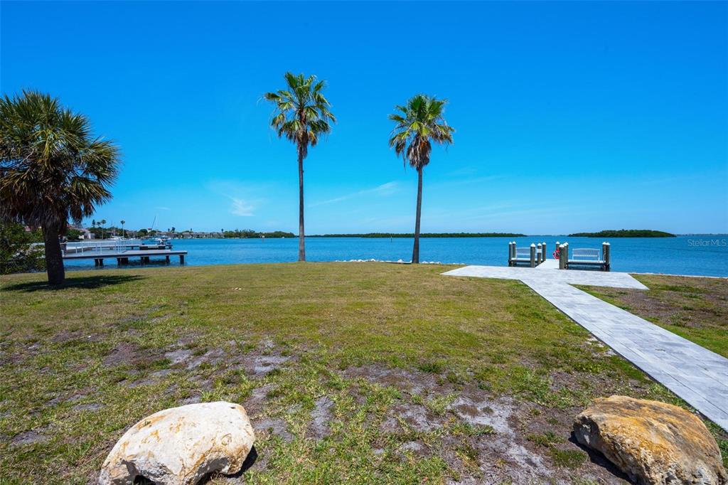 581 Rountree Drive Longboat Key, FL 34228 - Photo 27 of 50 a view of a garden and swimming pool