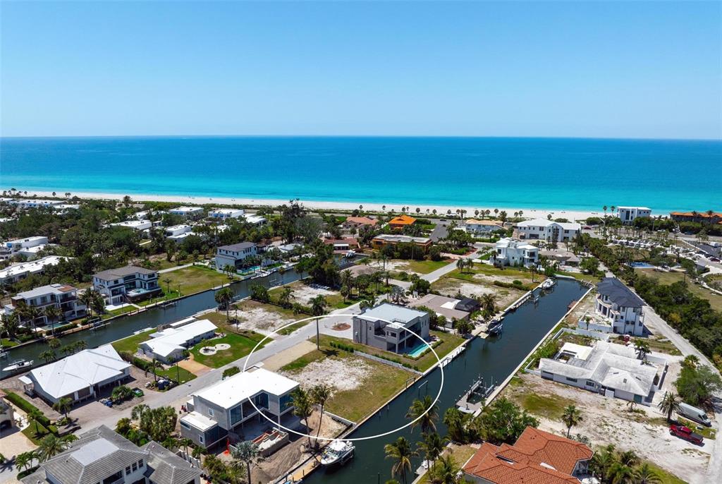 581 Rountree Drive Longboat Key, FL 34228 - Photo 42 of 50 an aerial view of a city with ocean view