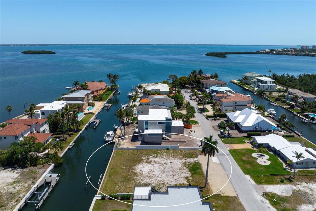 581 Rountree Drive Longboat Key, FL 34228 - Photo 47 of 50 an aerial view of a house with a ocean view