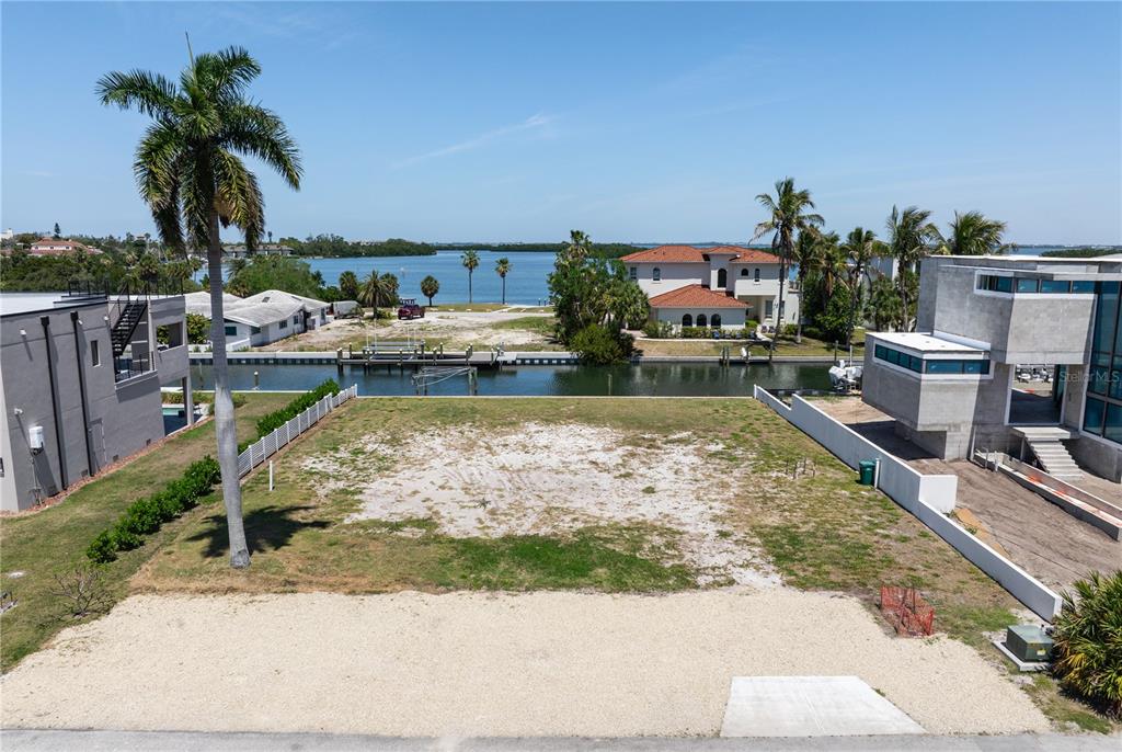 581 Rountree Drive Longboat Key, FL 34228 - Photo 49 of 50 a view of a swimming pool with a lounge chair