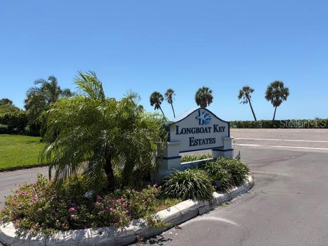 581 Rountree Drive Longboat Key, FL 34228 - Photo 7 of 50 a front view of a house with a yard