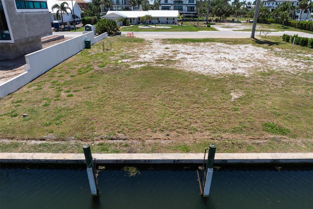 581 Rountree Drive Longboat Key, FL 34228 - Photo 8 of 50 a view of swimming pool with a yard