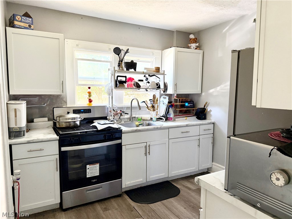 869 Berwin Street Akron, OH 44310 - Photo 11 of 16 Spacious kitchen featuring appliances.