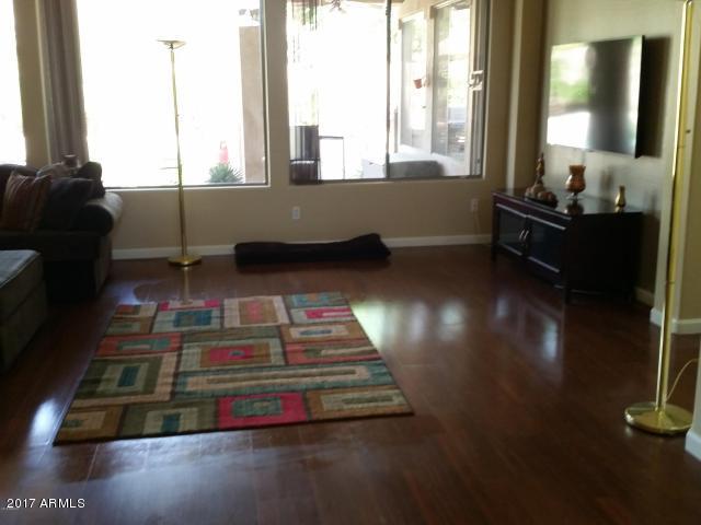 11014 East Decatur Street Mesa, AZ 85207 - Photo 5 of 13 Wood floors in living over looking patio