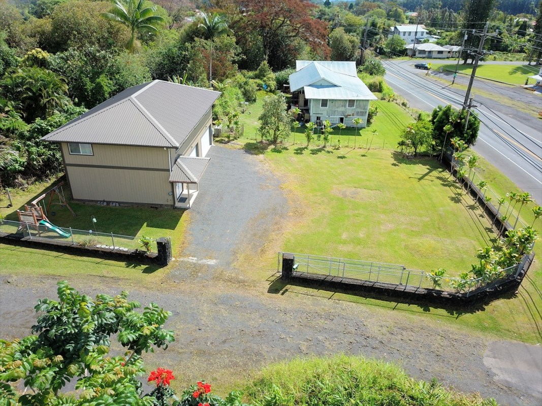 18-1354 Nichols Rd Mountain View Mountain View, HI 96771 - Photo 27 of 30 an aerial view of a house with yard swimming pool and outdoor seating