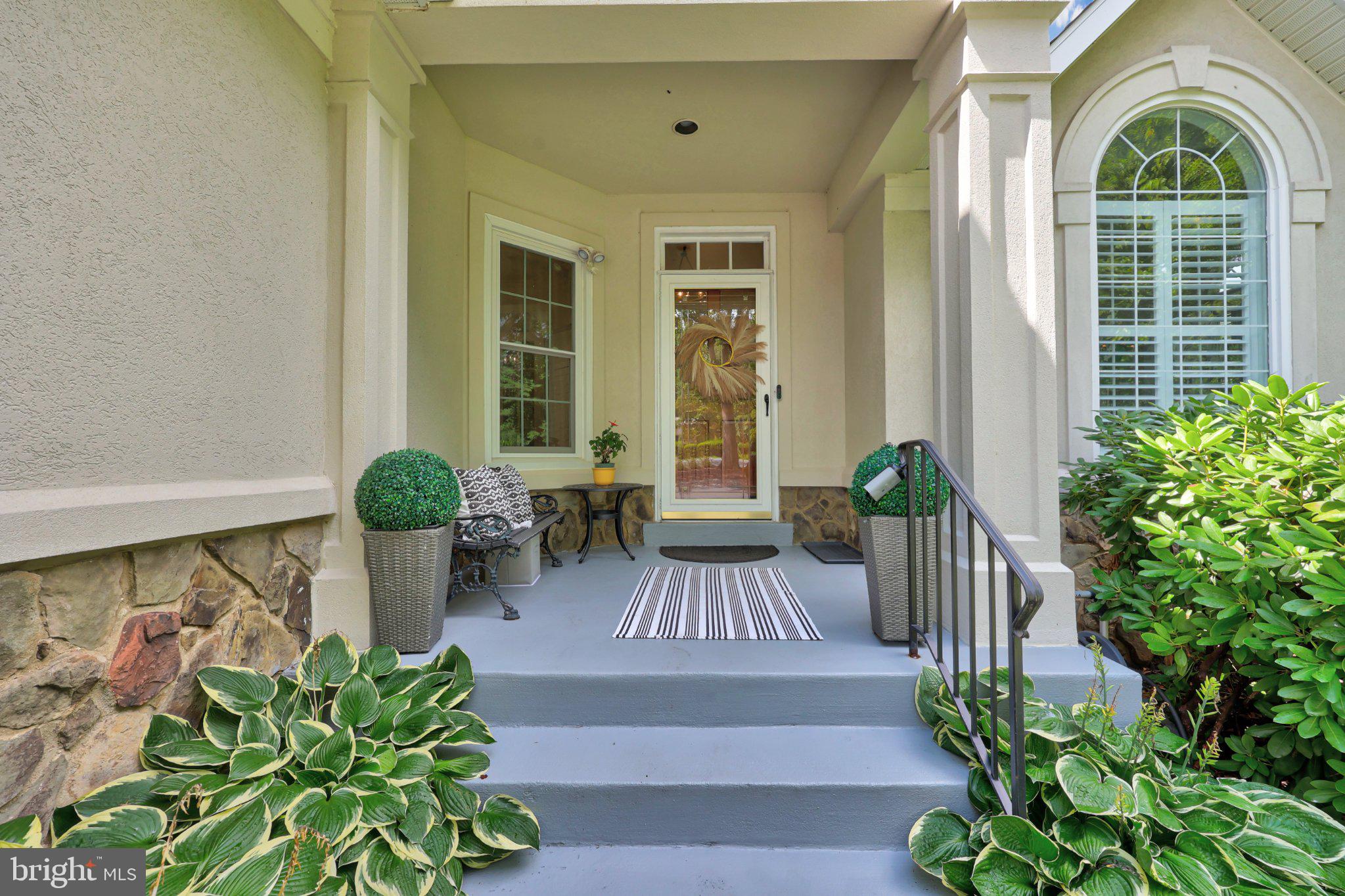6732 Churchill Road McLean, VA 22101 - Photo 3 of 71 Charming entryway with lush greenery.
