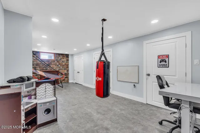a bedroom with two beds and a large window