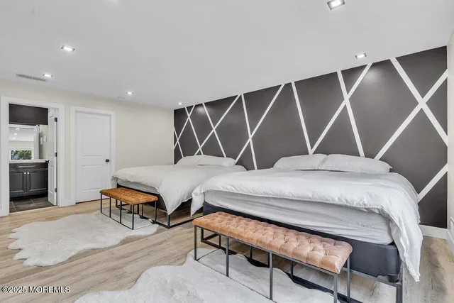 a view of a patio with table and chairs and potted plants