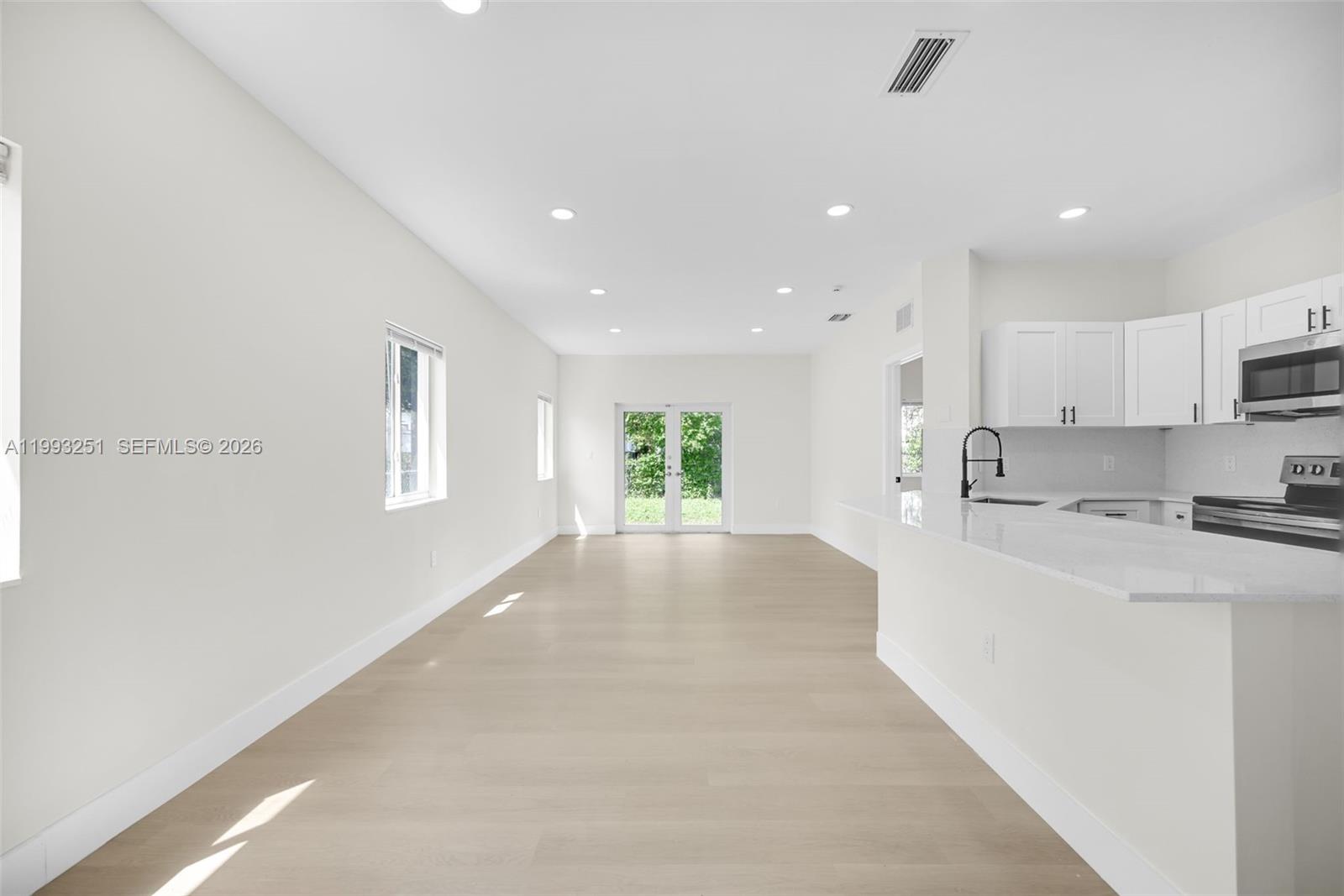 6940 Northwest 5th Place Miami, FL 33150 - Photo 12 of 42 a view of kitchen with sink and refrigerator