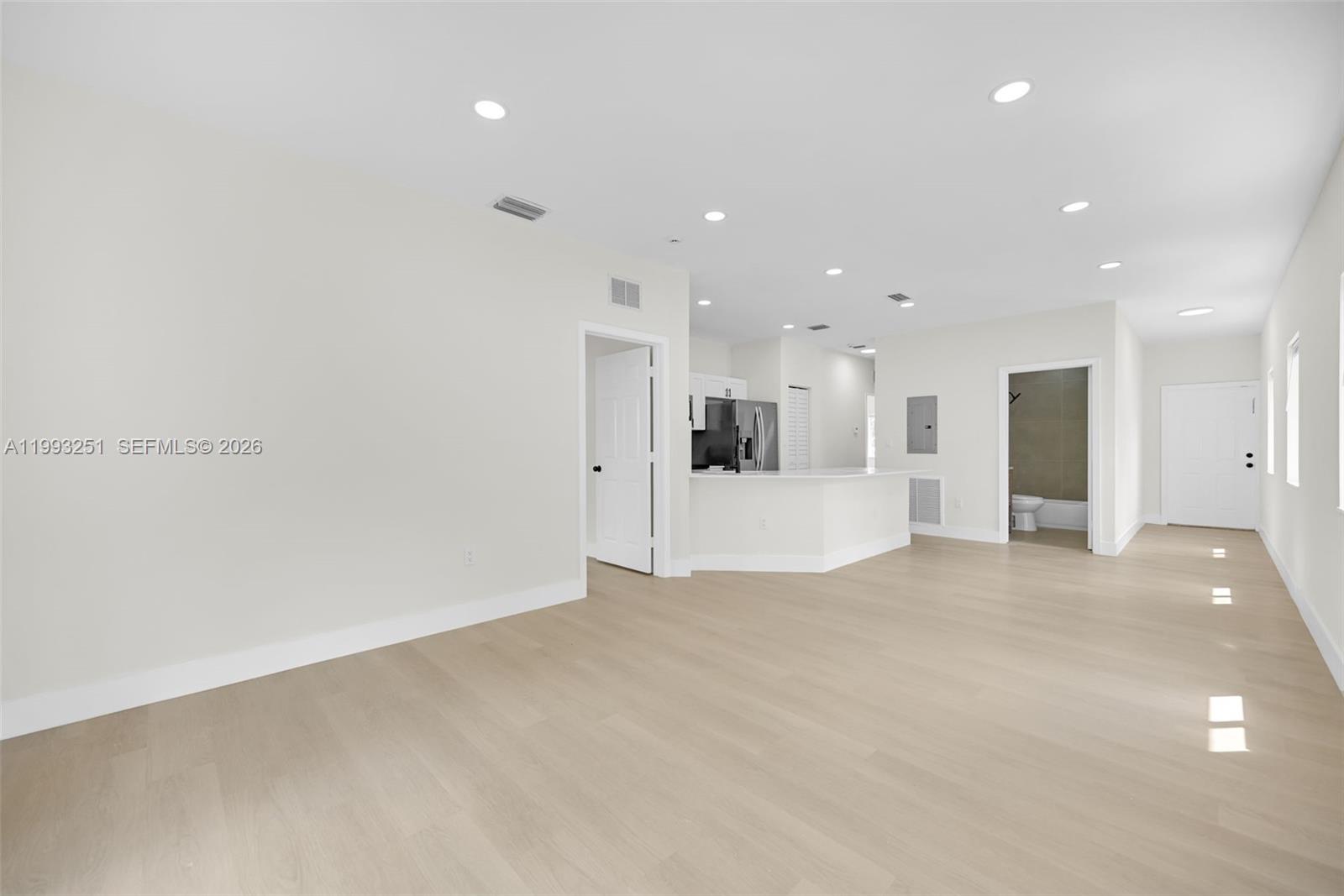 6940 Northwest 5th Place Miami, FL 33150 - Photo 16 of 42 a view of an empty room with kitchen
