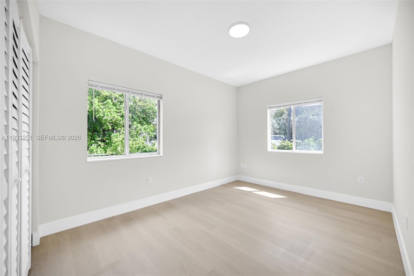 6940 Northwest 5th Place Miami, FL 33150 - Photo 29 of 42 an empty room with a window