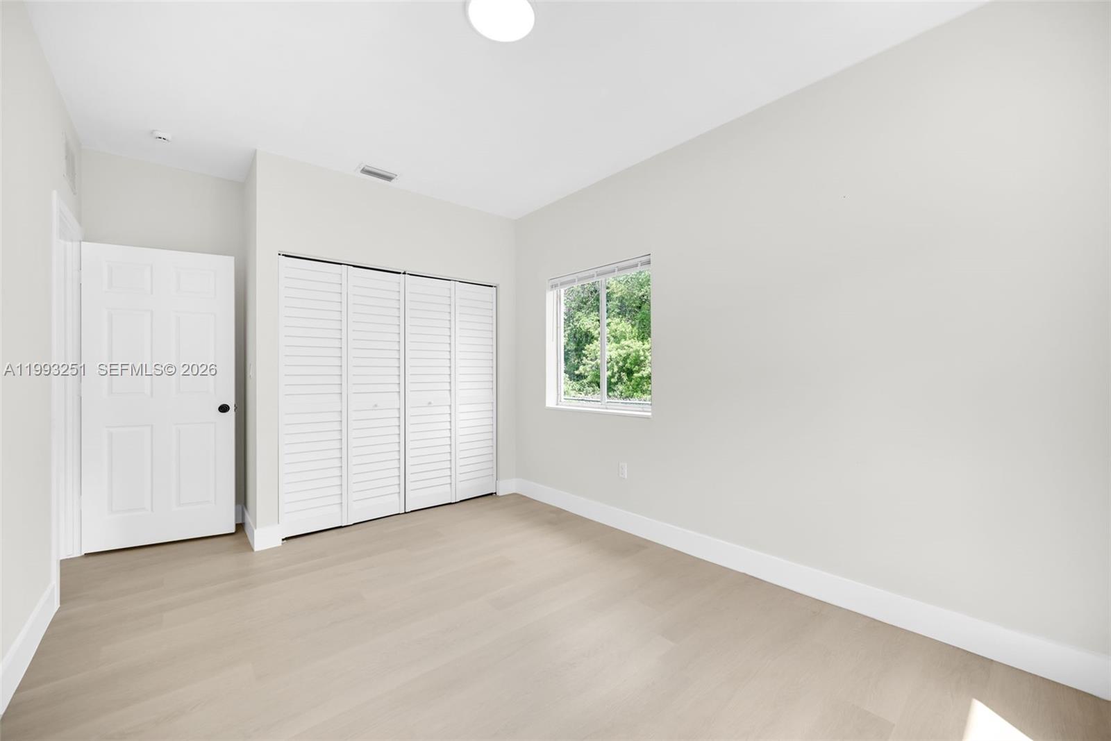 6940 Northwest 5th Place Miami, FL 33150 - Photo 30 of 42 an empty room with windows