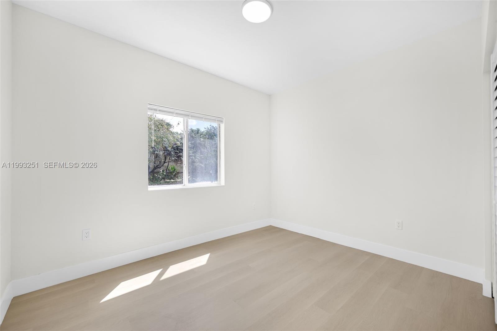 6940 Northwest 5th Place Miami, FL 33150 - Photo 36 of 42 an empty room with a window