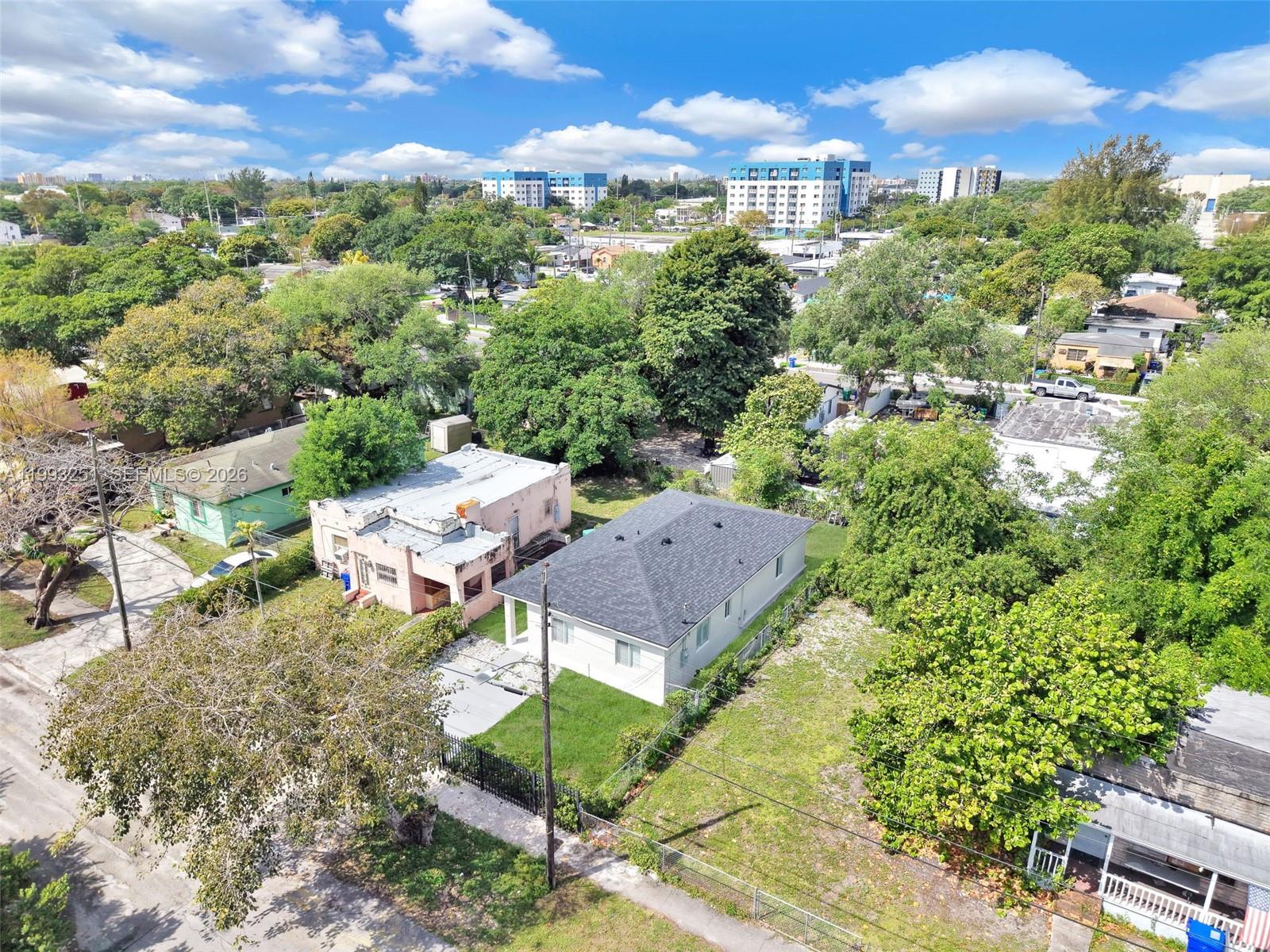 6940 Northwest 5th Place Miami, FL 33150 - Photo 40 of 42 an aerial view of multiple houses with yard