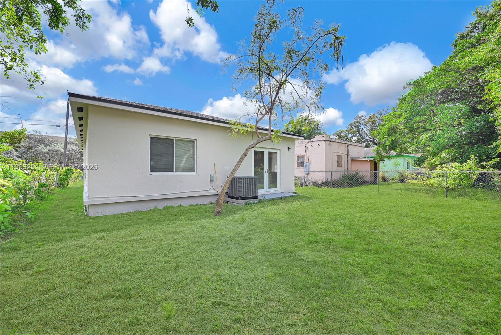6940 Northwest 5th Place Miami, FL 33150 - Photo 9 of 42 a view of a house with a backyard