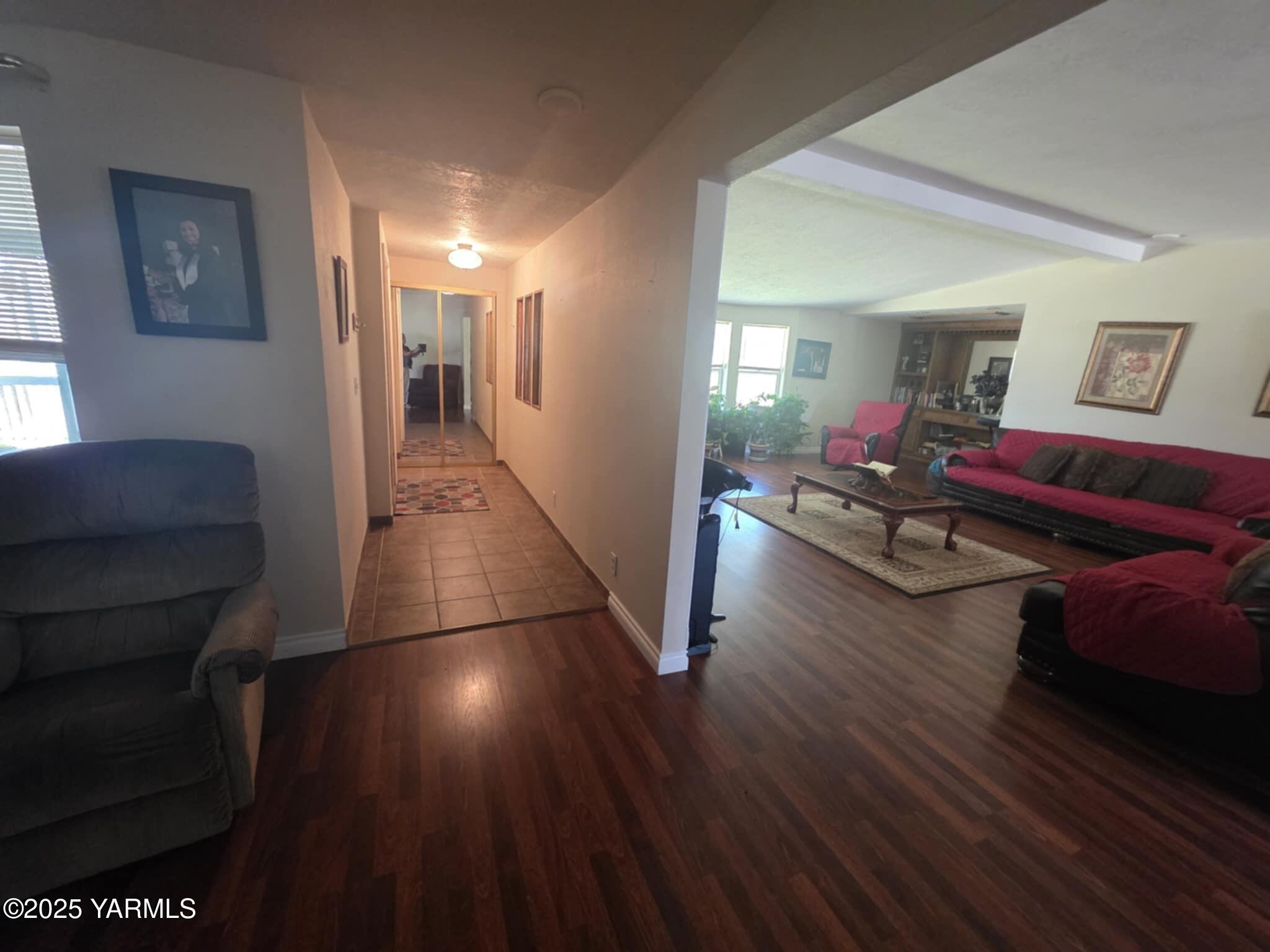 5202 Norman Road Yakima, WA 98901 - Photo 29 of 48 a living room with furniture and a wooden floor