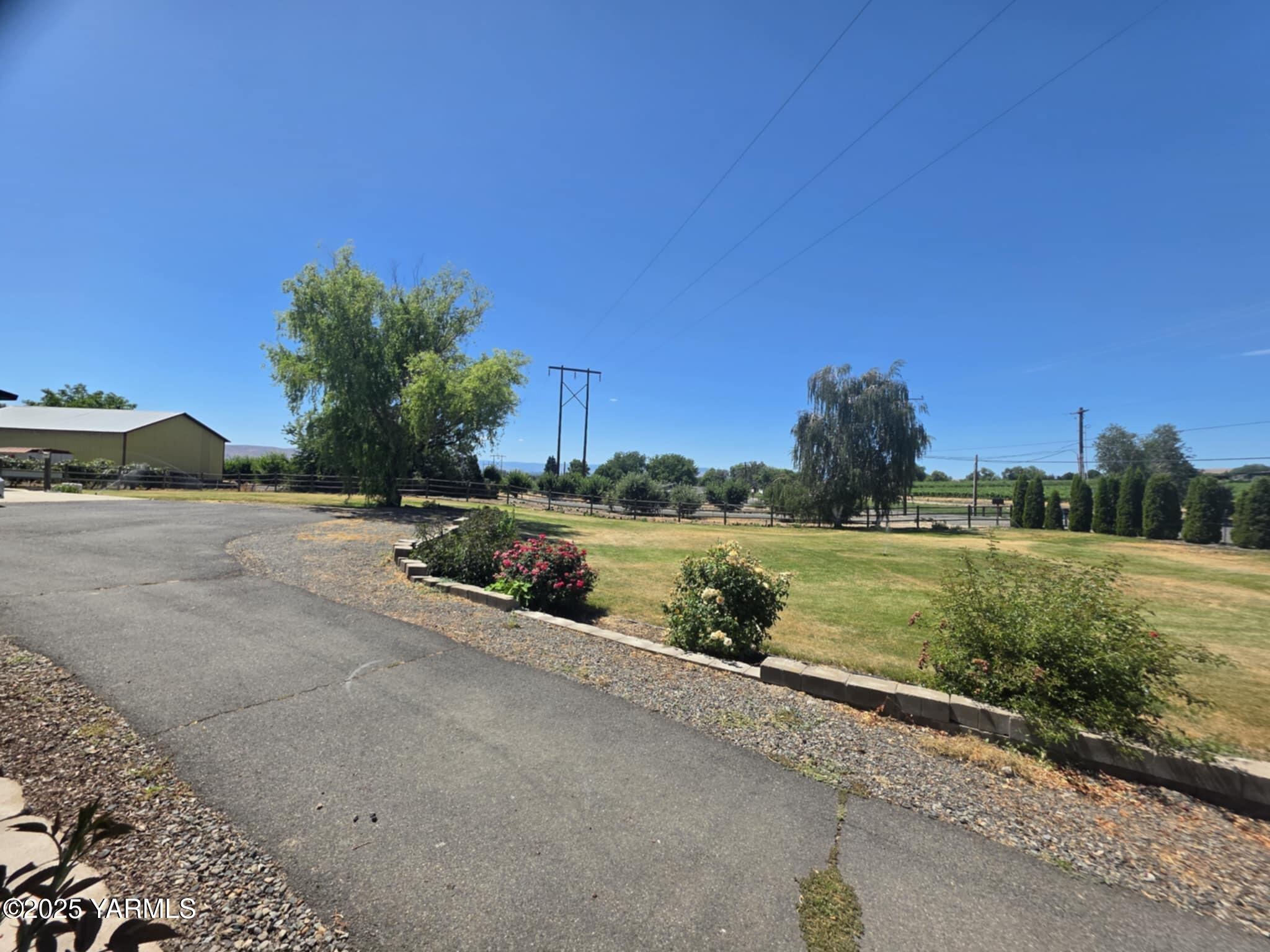 5202 Norman Road Yakima, WA 98901 - Photo 37 of 48 a view of a lake with outdoor space