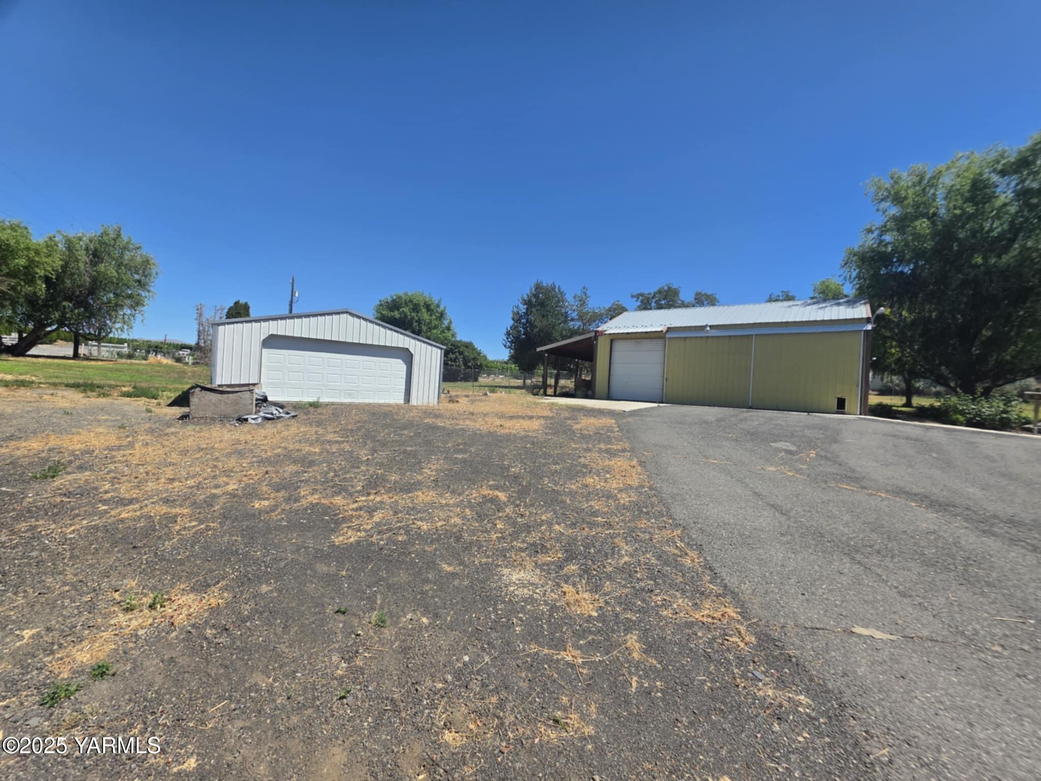 5202 Norman Road Yakima, WA 98901 - Photo 7 of 48 a view of a house with outdoor space
