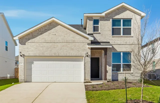 a view of house with yard