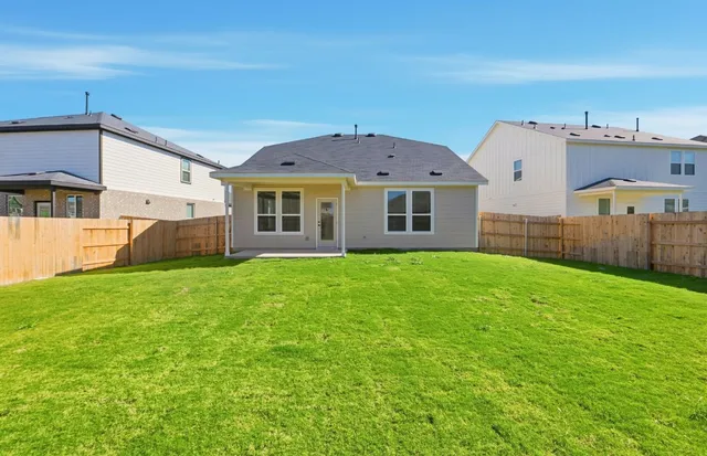 a view of a backyard with flat screen tv
