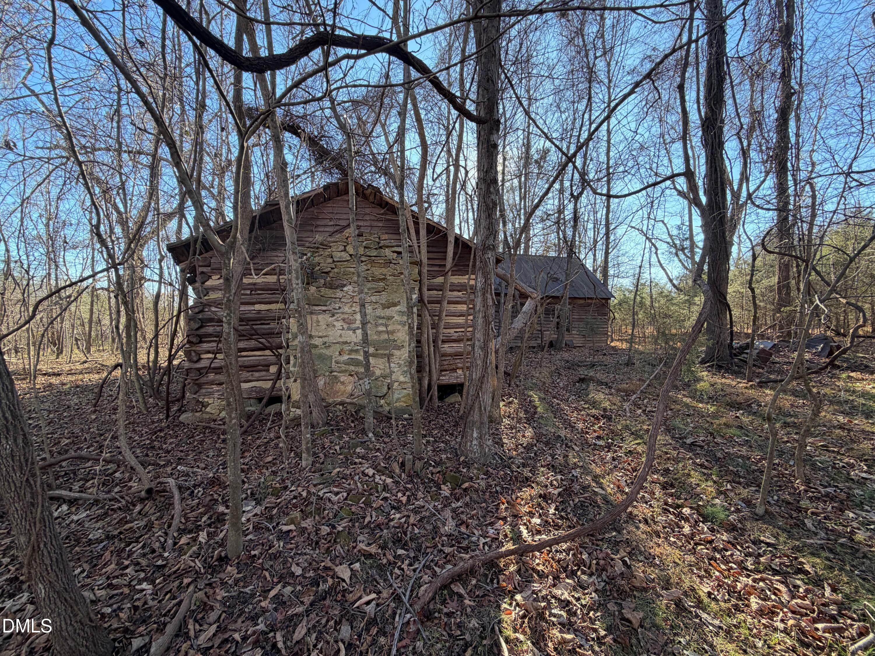 0 Lewis Winstead Lp Road Roxboro, NC 27574 - Photo 13 of 17 a backyard of a house with lots of green space