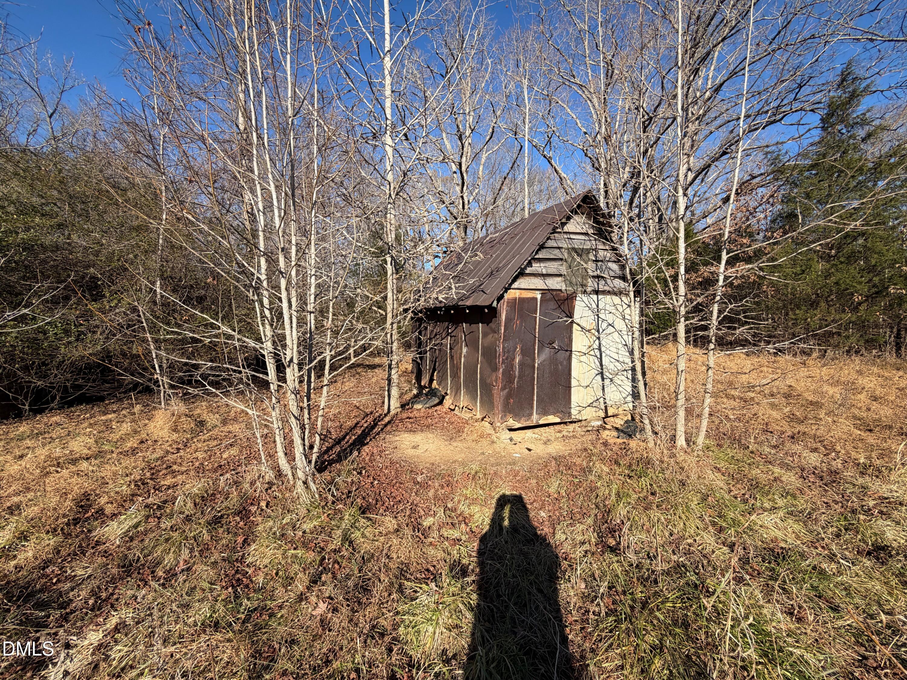 0 Lewis Winstead Lp Road Roxboro, NC 27574 - Photo 7 of 17 a view of a house with a yard