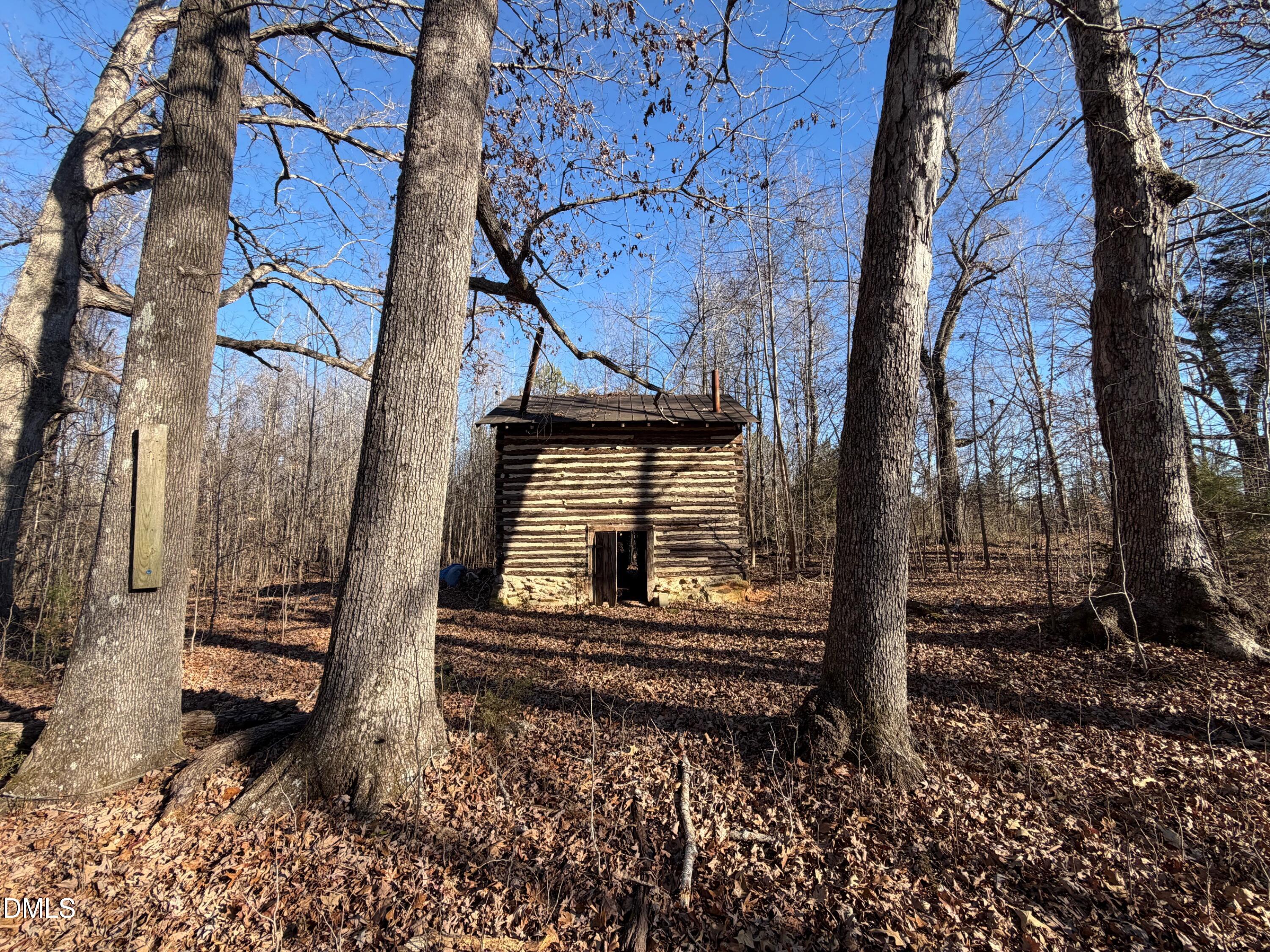 0 Lewis Winstead Lp Road Roxboro, NC 27574 - Photo 10 of 17 a front view of a house with a yard