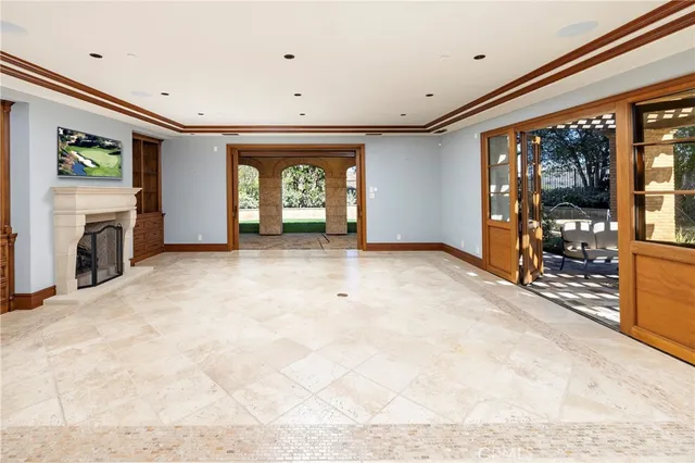 a spacious bathroom with a granite countertop sink mirror and shower