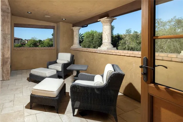 a bathroom with a granite countertop sink a toilet a mirror and shower