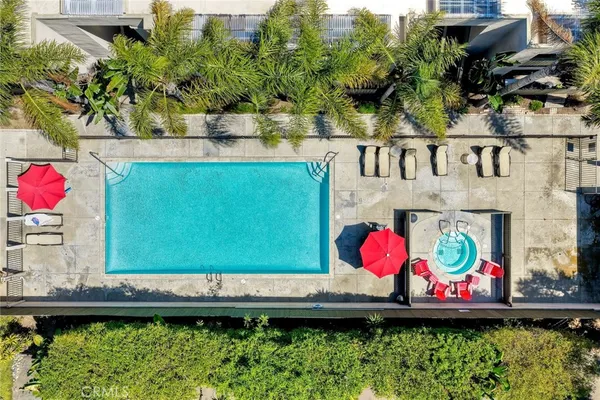 a view of outdoor area with seating area and potted plants