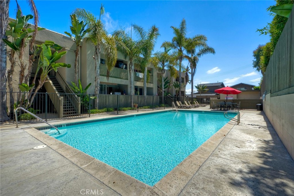 149 West Glaucus Street, Unit D Encinitas, CA 92024 - Photo 20 of 29 a view of swimming pool with a patio and a yard