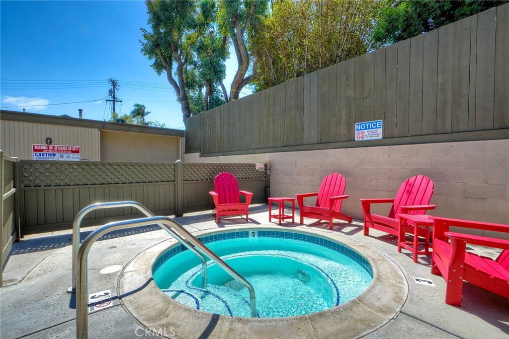 149 West Glaucus Street, Unit D Encinitas, CA 92024 - Photo 21 of 29 a backyard of a house with seating space and trees