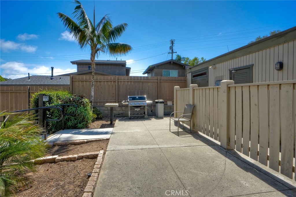 149 West Glaucus Street, Unit D Encinitas, CA 92024 - Photo 25 of 29 a view of a backyard and a patio