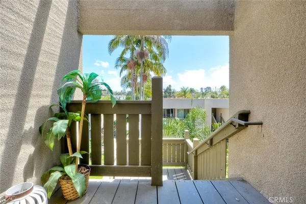 a view of porch with a potted plant