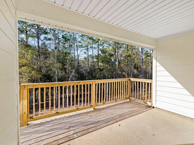 a kitchen with granite countertop kitchen island sink stove and granite counter top