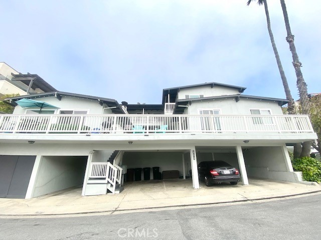 a view of a house with roof deck