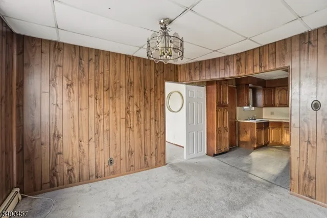 a kitchen with a stove top oven sink and cabinets