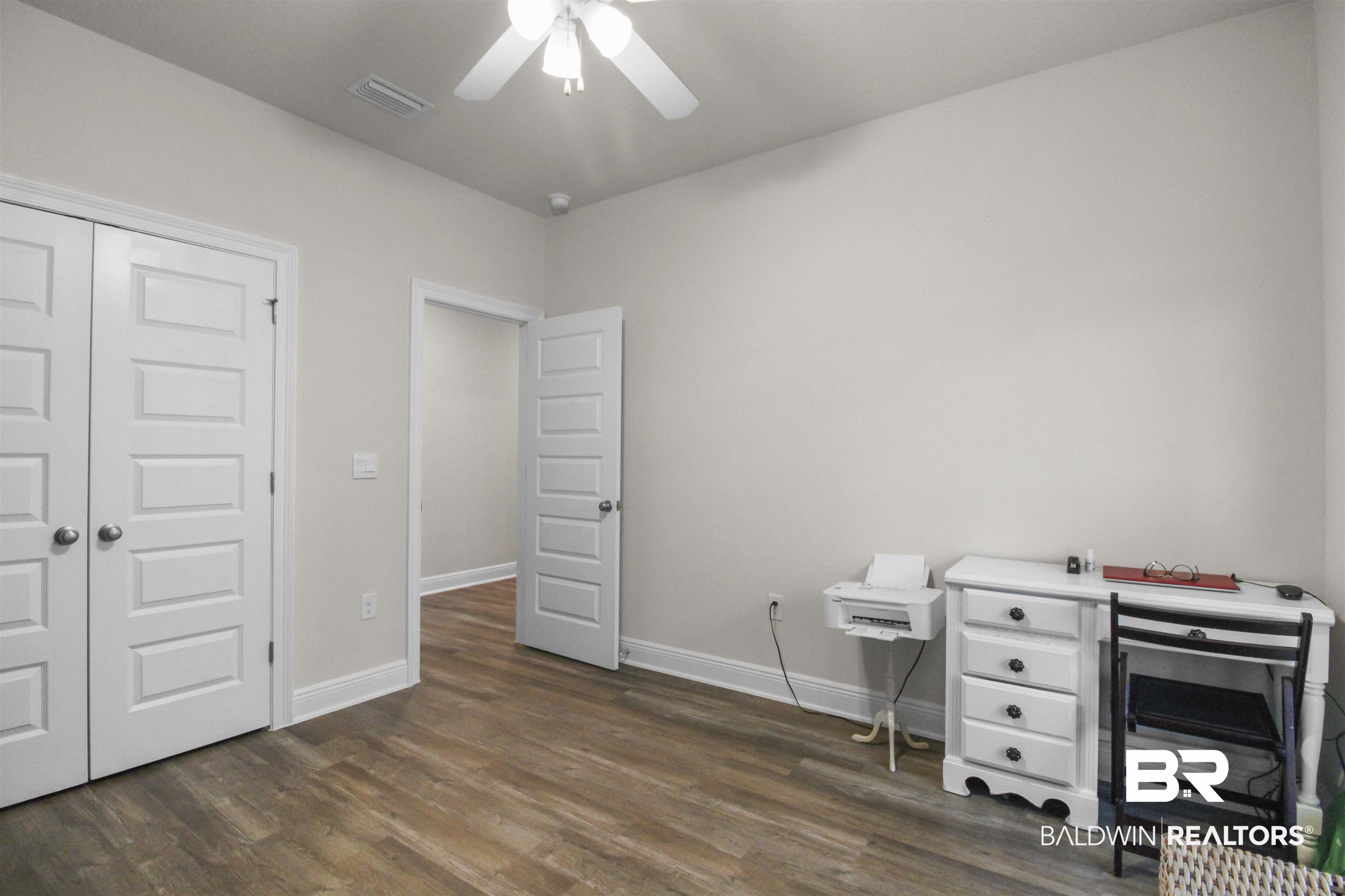 12523 Pheasant Run Elberta, AL 36530 - Photo 29 of 43 Office featuring ceiling fan and dark wood-style floors