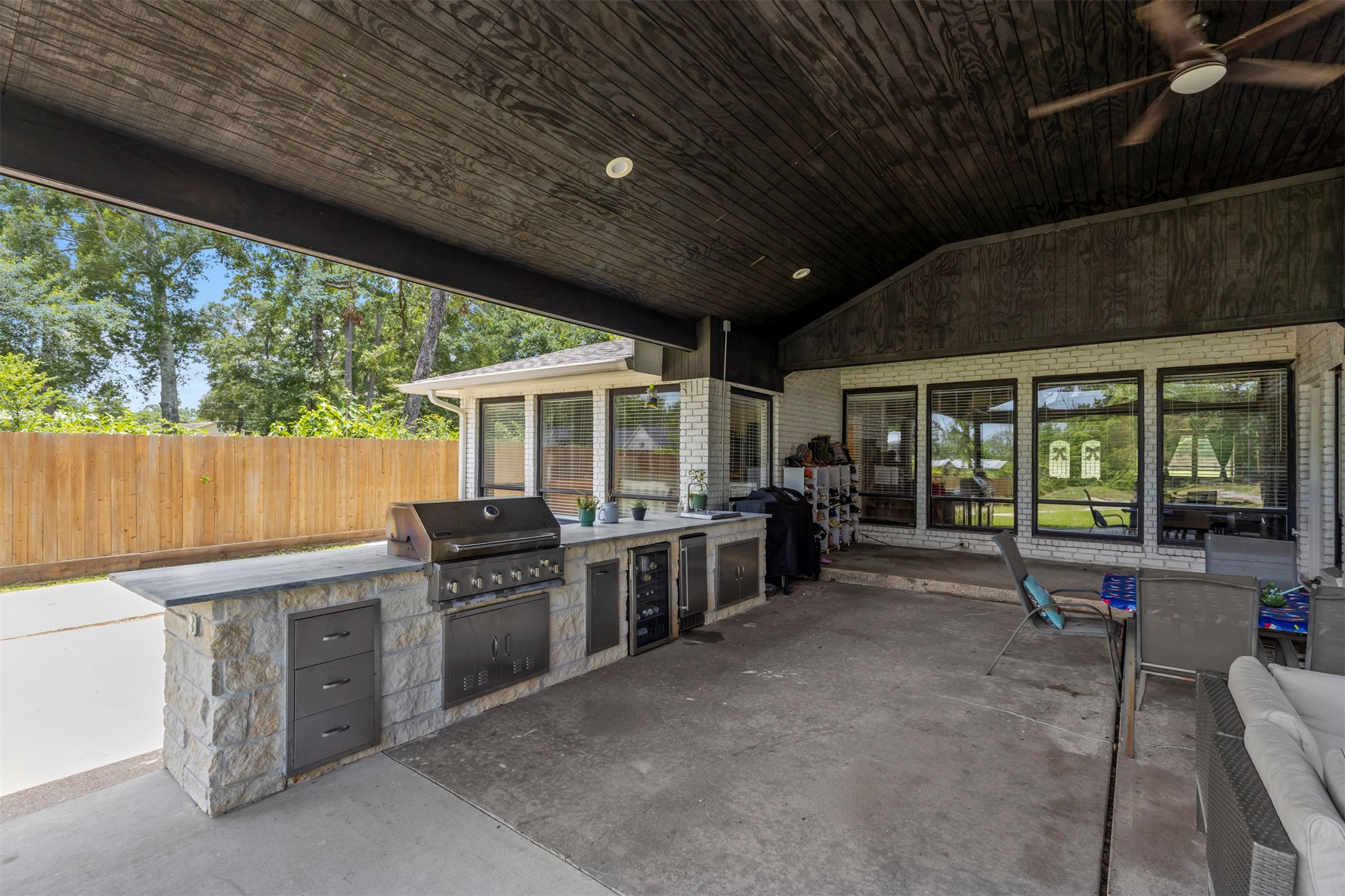 18022 Rogers Road New Waverly, TX 77358 - Photo 42 of 49 Outdoor Kitchen On Covered Veranda